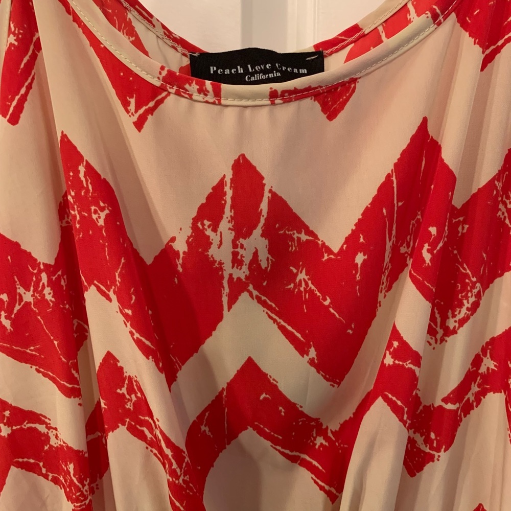Red and cream romper.